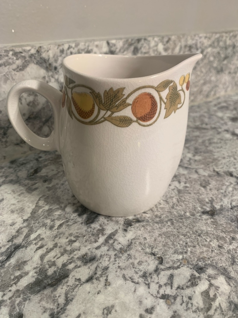 Pickwick
by FRANCISCAN Ceramic Creamer Pitcher with Orange and Gold Fruit Border
